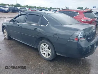 2015 Chevrolet Impala LT with VIN 2G1WB5E33F1164692, listed as a IAAI auction lot 42062791 with 129,022 mi miles and . Bid and sale history available at DreamBid. Image 3.