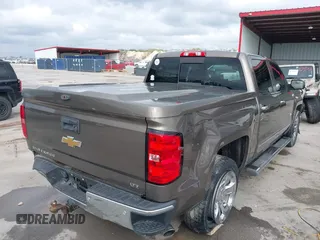 2015 Chevrolet Silverado 1500 LTZ with VIN 3GCPCSEC6FG408754, listed as a IAAI auction lot 41514369 with 140,928 mi miles and . Bid and sale history available at DreamBid. Image 4.