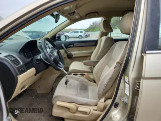 2009 Honda CR-V LX z VIN 5J6RE48309L006028, wystawiony jako Copart lot #58186465 z przebiegiem 214 896 mil mil oraz Szkoda całkowita • Salvage title. Historia ofert i sprzedaży dostępna na DreamBid. Obrazek 7.