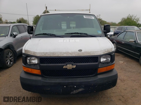 2010 Chevrolet Express Cargo Van with VIN 1GCUGADX5A1176855, listed as a Copart auction lot 49880964 with 198,739 mi miles and Salvage Title. Bid and sale history available at carsss.com. Image 5.