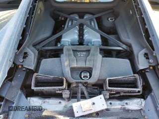 2021 Audi R8 V10 z VIN WUABAAFX8M7900919, wystawiony jako Copart lot #44812725 z przebiegiem 21 390 mil mil oraz Szkoda całkowita • Salvage title. Historia ofert i sprzedaży dostępna na DreamBid. Obrazek 13.