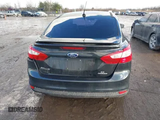 2013 Ford Focus SE z VIN 1FADP3F27DL342384, wystawiony jako IAAI lot #41474290 z przebiegiem 125 664 mil mil oraz . Historia ofert i sprzedaży dostępna na DreamBid. Obrazek 17.