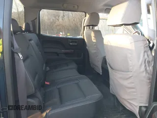 2015 GMC Sierra 2500HD available WiFi SLT with VIN 1GT12ZEG7FF606328, listed as a IAAI auction lot 41793799 with 94,107 mi miles. Bid and sale history available at carsss.com. Image 8.