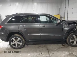 2016 Jeep Grand Cherokee Limited 75th Anniversary with VIN 1C4RJFBG3GC311089, listed as a IAAI auction lot 41953517 with 127,720 mi miles and . Bid and sale history available at DreamBid. Image 13.
