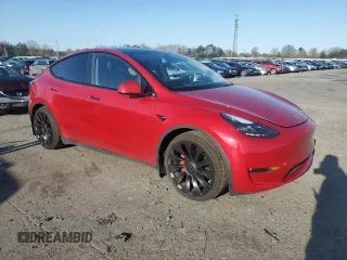 2023 Tesla Model Y Performance with VIN 7SAYGDEF4PF960357, listed as a Copart auction lot 51126105 with 37,252 mi miles and Salvage Title. Bid and sale history available at DreamBid. Image 4.