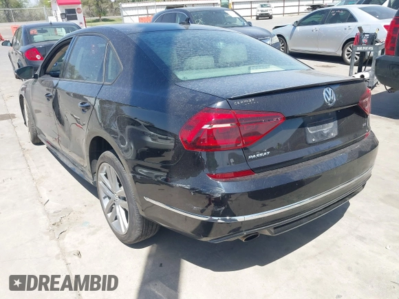 2018 Volkswagen Passat 2.0T S with VIN 1VWAA7A31JC015784, listed as a IAAI auction lot 41829586 with 72,437 mi miles. Bid and sale history available at carsss.com. Image 3.