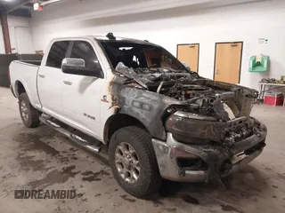 2020 Ram 2500 Laramie z VIN 3C6UR5FL4LG103628, wystawiony jako IAAI lot #41434355 z przebiegiem Nie podano mil oraz . Historia ofert i sprzedaży dostępna na DreamBid. Obrazek 1.