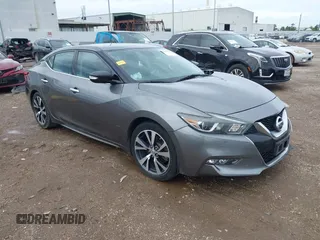2017 Nissan Maxima S with VIN 1N4AA6APXHC401250, listed as a IAAI auction lot 42497780 with 204,665 mi miles and . Bid and sale history available at DreamBid. Image 1.