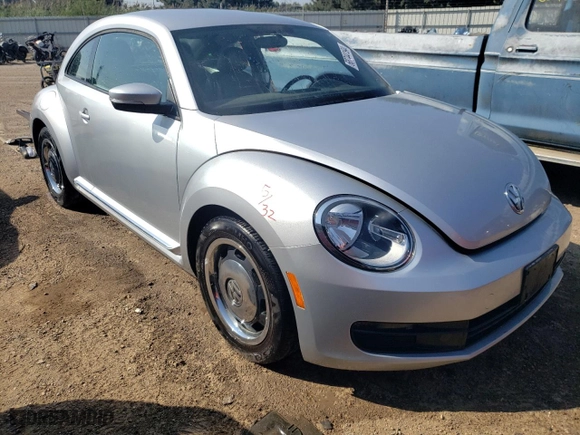 2012 Volkswagen Beetle 2.5L w/Sun PZEV with VIN 3VWJP7AT6CM601557, listed as a Copart auction lot 68744194 with 71,713 mi miles and Salvage Title. Bid and sale history available at carsss.com. Image 4.