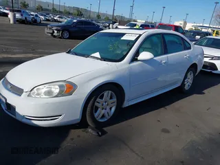 2013 Chevrolet Impala LT with VIN 2G1WG5E3XD1265193, listed as a IAAI auction lot 41948228 with 171,122 mi miles and . Bid and sale history available at DreamBid. Image 2.