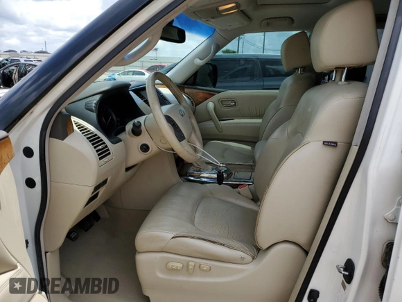 2014 Infiniti QX80 with VIN JN8AZ2NF4E9555558, listed as a Copart auction lot 54570895 with 123,433 mi miles and Salvage title. Bid and sale history available at DreamBid. Image 7.