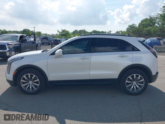 2020 Cadillac XT4 FWD Sport with VIN 1GYFZER4XLF116224, listed as a IAAI auction lot 42759271 with 31,395 mi miles and . Bid and sale history available at DreamBid. Image 14.