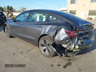 2022 Tesla Model 3 Long Range with VIN 5YJ3E1EB4NF293635, listed as a IAAI auction lot 41388234 with 28,396 mi miles and . Bid and sale history available at DreamBid. Image 3.