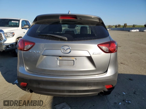 2014 Mazda CX-5 Grand Touring with VIN JM3KE2DY8E0412025, listed as a Copart auction lot 42863655 with 72,416 mi miles and Salvage Title. Bid and sale history available at carsss.com. Image 6.