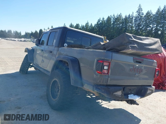 2023 Jeep Gladiator Rubicon with VIN 1C6JJTBG6PL538859, listed as a IAAI auction lot 42633055 with 22,899 mi miles and . Bid and sale history available at DreamBid. Image 3.