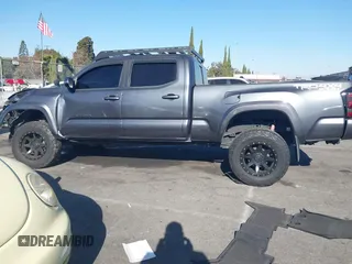 2021 Toyota Tacoma 4WD SR5 with VIN 3TMDZ5BNXMM107525, listed as a IAAI auction lot 41062698 with 41,771 mi miles. Bid and sale history available at carsss.com. Image 14.