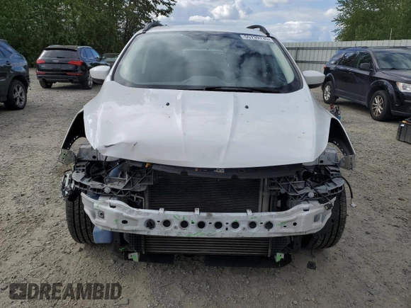 2014 Ford Escape SE с VIN 1FMCU0GX7EUA94118, выставлен на аукционе Copart как лот 55739735 с пробегом 139 208 миль миль и Списание • Salvage title. История ставок и продаж доступна на DreamBid. Изображение 5.