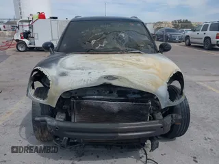 2014 MINI Countryman S with VIN WMWZC3C55EWP25697, listed as a IAAI auction lot 41797132 with Not Provided miles and . Bid and sale history available at DreamBid. Image 11.