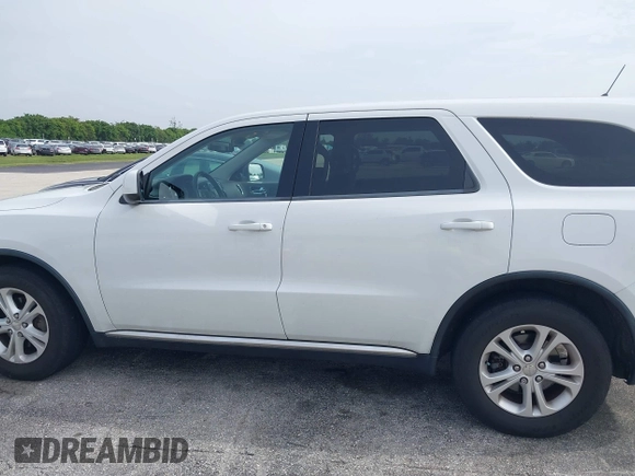2013 Dodge Durango SXT with VIN 1C4RDHAG1DC669503, listed as a IAAI auction lot 42614210 with 103,482 mi miles and . Bid and sale history available at DreamBid. Image 14.