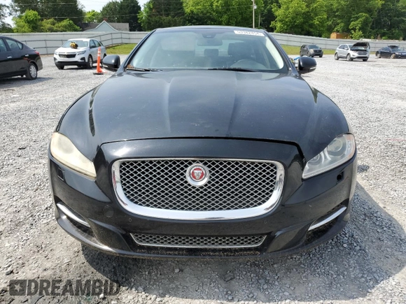 2014 Jaguar XJ with VIN SAJWA2GZ7E8V60213, listed as a Copart auction lot 53382454 with 88,870 mi miles and Salvage Title. Bid and sale history available at carsss.com. Image 5.