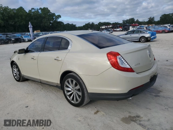 2014 Lincoln MKS with VIN 1LNHL9DKXEG612758, listed as a Copart auction lot 53230065 with 98,863 mi miles and Salvage Title. Bid and sale history available at carsss.com. Image 2.
