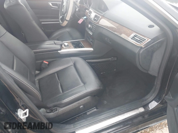 2014 Mercedes-Benz E 350 Sport with VIN WDDHF5KB2EA977354, listed as a IAAI auction lot 42403760 with 92,055 mi miles and . Bid and sale history available at DreamBid. Image 5.