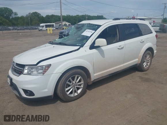 2017 Dodge Journey SXT z VIN 3C4PDCBG8HT534473, wystawiony jako IAAI lot #42351286 z przebiegiem 127 917 mil mil oraz . Historia ofert i sprzedaży dostępna na DreamBid. Obrazek 2.