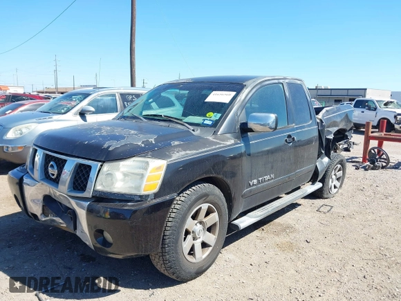 2005 Nissan Titan XE with VIN 1N6BA06A15N560400, listed as a IAAI auction lot 41656560 with 212,568 mi miles. Bid and sale history available at carsss.com. Image 17.