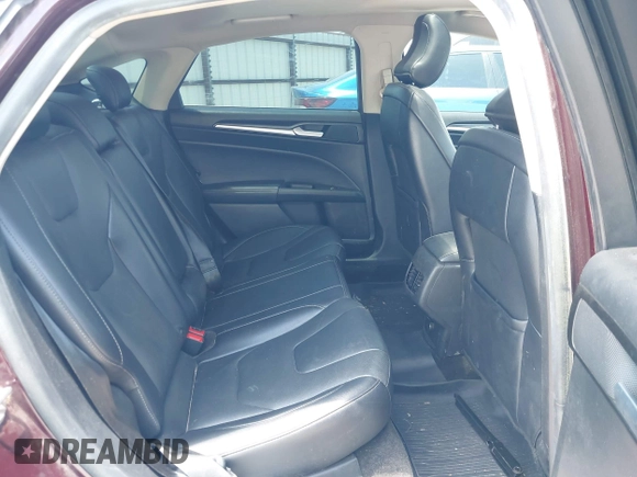 2018 Ford Fusion Titanium with VIN 3FA6P0K92JR114283, listed as a IAAI auction lot 42704476 with 92,502 mi miles and . Bid and sale history available at DreamBid. Image 8.