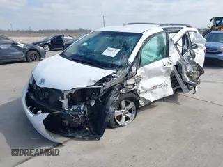 2016 Toyota Sienna LE AAS with VIN 5TDKK3DC2GS731724, listed as a IAAI auction lot 41631571 with 88,900 mi miles. Bid and sale history available at carsss.com. Image 2.