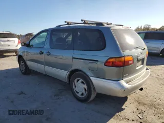 2000 Toyota Sienna LE with VIN 4T3ZF13C2YU281355, listed as a Copart auction lot 76415954 with 133,763 mi miles and Salvage Title. Bid and sale history available at carsss.com. Image 2.
