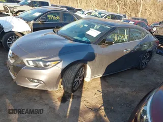 2016 Nissan Maxima SL with VIN 1N4AA6AP3GC401167, listed as a IAAI auction lot 41737278 with 121,258 mi miles and . Bid and sale history available at DreamBid. Image 2.