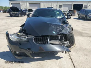 2010 BMW 3 Series 335i with VIN WBAWL7C59AP476237, listed as a Copart auction lot 52363615 with Not provided miles and Salvage title. Bid and sale history available at DreamBid. Image 5.