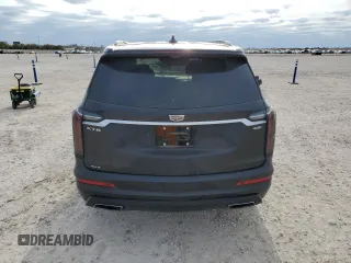2020 Cadillac XT6 AWD Sport z VIN 1GYKPHRS2LZ172371, wystawiony jako Copart lot #84940074 z przebiegiem Nie podano mil oraz Szkoda całkowita • Salvage title. Historia ofert i sprzedaży dostępna na DreamBid. Obrazek 6.