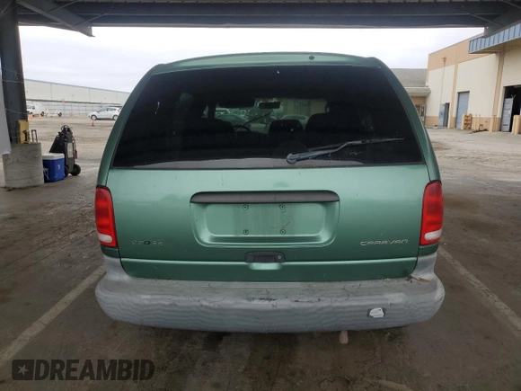 1999 Dodge Caravan with VIN 2B4GP25R8XR200747, listed as a Copart auction lot 58273225 with 182,147 mi miles and Salvage title. Bid and sale history available at DreamBid. Image 6.