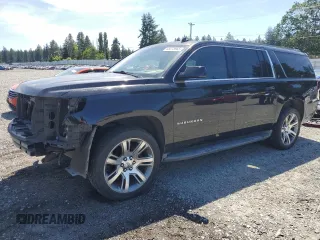2015 Chevrolet Suburban LT with VIN 1GNSKJKC8FR183367, listed as a Copart auction lot 58378965 with 124,596 mi miles and Salvage title. Bid and sale history available at DreamBid. Image 1.