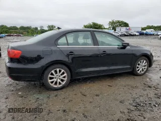 2013 Volkswagen Jetta SE with VIN 3VWDP7AJ4DM425976, listed as a Copart auction lot 58095525 with 77,395 mi miles and Salvage title. Bid and sale history available at DreamBid. Image 3.