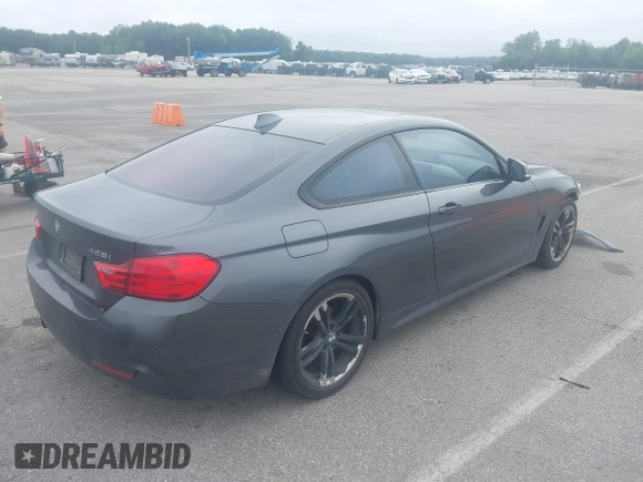 2014 BMW 4 Series 428i with VIN WBA3N7C52EK221929, listed as a IAAI auction lot 42530110 with 126,828 mi miles and . Bid and sale history available at DreamBid. Image 4.