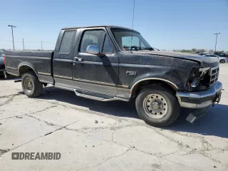 1995 Ford F-150 with VIN 1FTEX15N9SKC13922, listed as a Copart auction lot 49737275 with 199,117 mi miles and Salvage Title. Bid and sale history available at carsss.com. Image 4.