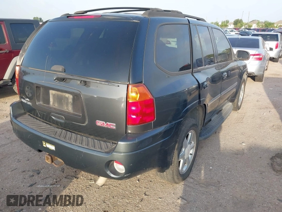 2007 GMC Envoy SLE z VIN 1GKDS13S872306655, wystawiony jako IAAI lot #42510039 z przebiegiem 174 377 mil mil oraz . Historia ofert i sprzedaży dostępna na DreamBid. Obrazek 4.
