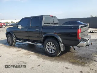 2000 Nissan Frontier XE with VIN 1N6ED27T7YC300373, listed as a Copart auction lot 55829535 with 301,305 mi miles and Salvage title. Bid and sale history available at DreamBid. Image 2.