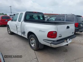 2003 Ford F-150 XL with VIN 1FTRX07263KD53880, listed as a IAAI auction lot 42422353 with 192,630 mi miles and . Bid and sale history available at DreamBid. Image 3.