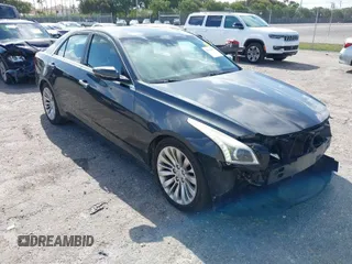 2014 Cadillac CTS Performance RWD with VIN 1G6AS5S36E0151499, listed as a IAAI auction lot 41945902 with 133,858 mi miles and . Bid and sale history available at DreamBid. Image 1.
