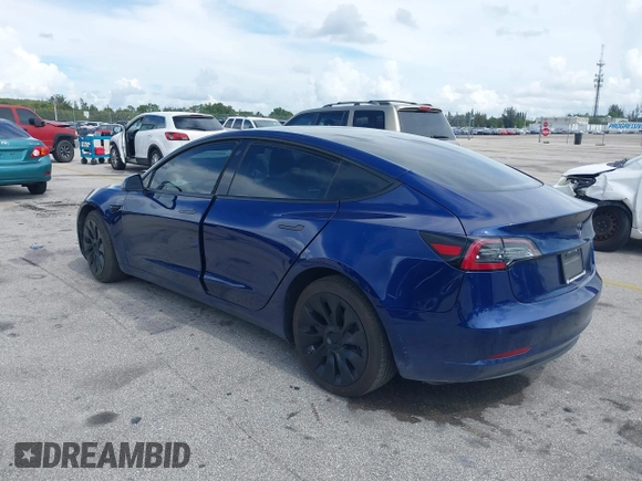 2022 Tesla Model 3 with VIN 5YJ3E1EA4NF191808, listed as a IAAI auction lot 39564406 with 6,756 mi miles. Bid and sale history available at carsss.com. Image 3.
