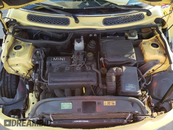 2002 MINI Hardtop with VIN WMWRC33422TC35953, listed as a Copart auction lot 42347465 with 126,890 mi miles and Salvage Title. Bid and sale history available at DreamBid. Image 11.