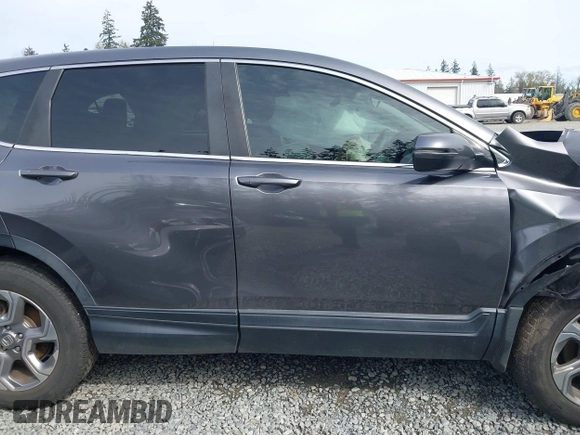 2019 Honda CR-V EX with VIN JHLRW2H57KX022530, listed as a IAAI auction lot 41970376 with 51,327 mi miles. Bid and sale history available at carsss.com. Image 14.