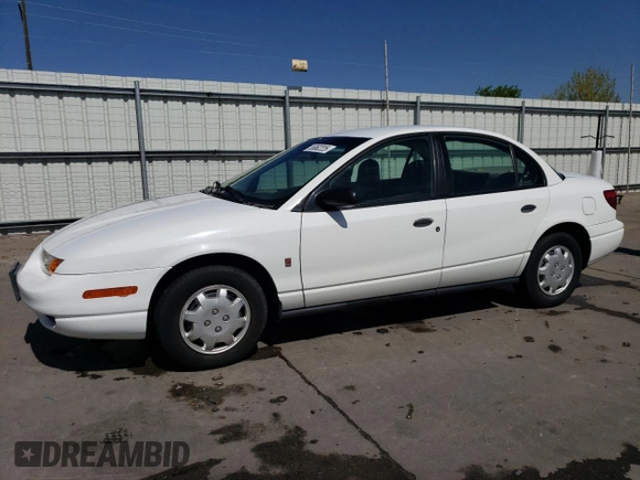 2002 Saturn SL z VIN 1G8ZH52882Z253088, wystawiony jako Copart lot #55062225 z przebiegiem 177 866 mil mil oraz Szkoda całkowita • Salvage title. Historia ofert i sprzedaży dostępna na DreamBid. Obrazek 1.
