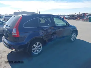 2011 Honda CR-V SE with VIN JHLRE4H47BC003313, listed as a IAAI auction lot 41732377 with 182,564 mi miles. Bid and sale history available at carsss.com. Image 4.