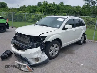 2012 Dodge Journey SXT with VIN 3C4PDCBG8CT371543, listed as a IAAI auction lot 42337728 with 174,615 mi miles and . Bid and sale history available at DreamBid. Image 17.