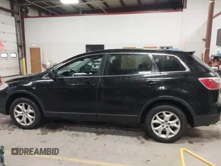 2011 Mazda CX-9 Sport with VIN JM3TB3BV9B0313270, listed as a IAAI auction lot 41474571 with 149,302 mi miles and . Bid and sale history available at DreamBid. Image 14.
